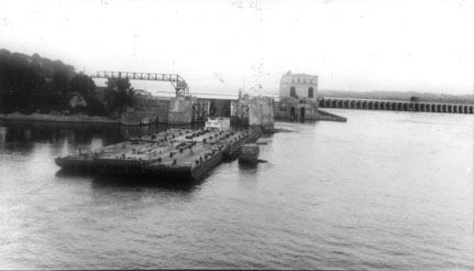 Another view of the original locks from the bridge which is swung open for barge traffoc, abt. 1950
